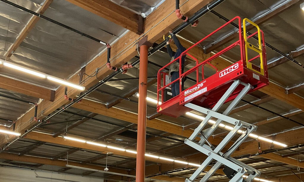 fire sprinkler inspection on scissor lift